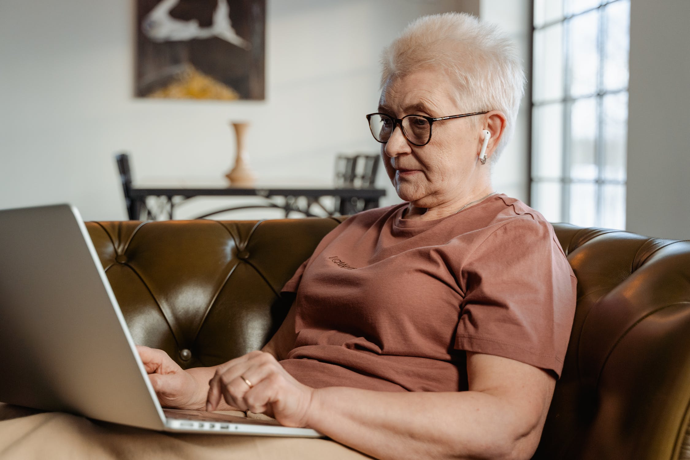 Woman on safe using laptop