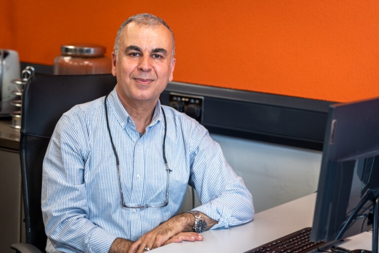 Older man in computer room