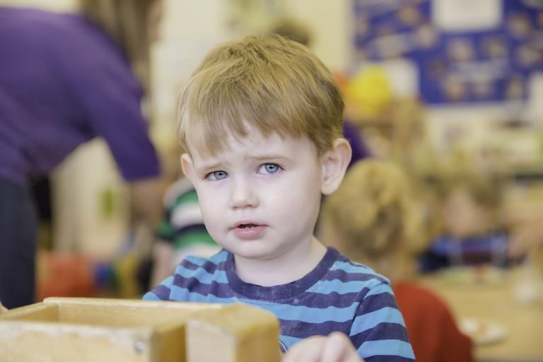 small boy in nursery