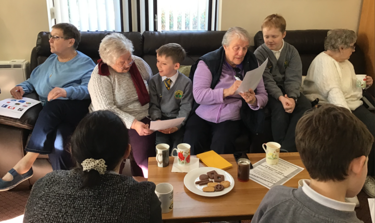 Digital heroes from Ysgol Borras meet residents from Cae Glo